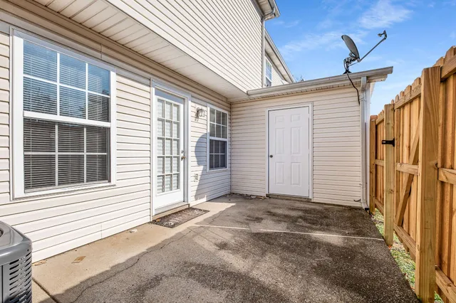 a view of a house with a large window