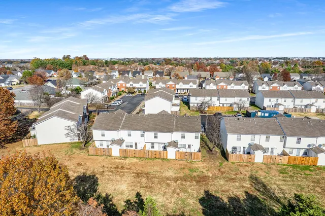 a picture of a room with a floor and white wall