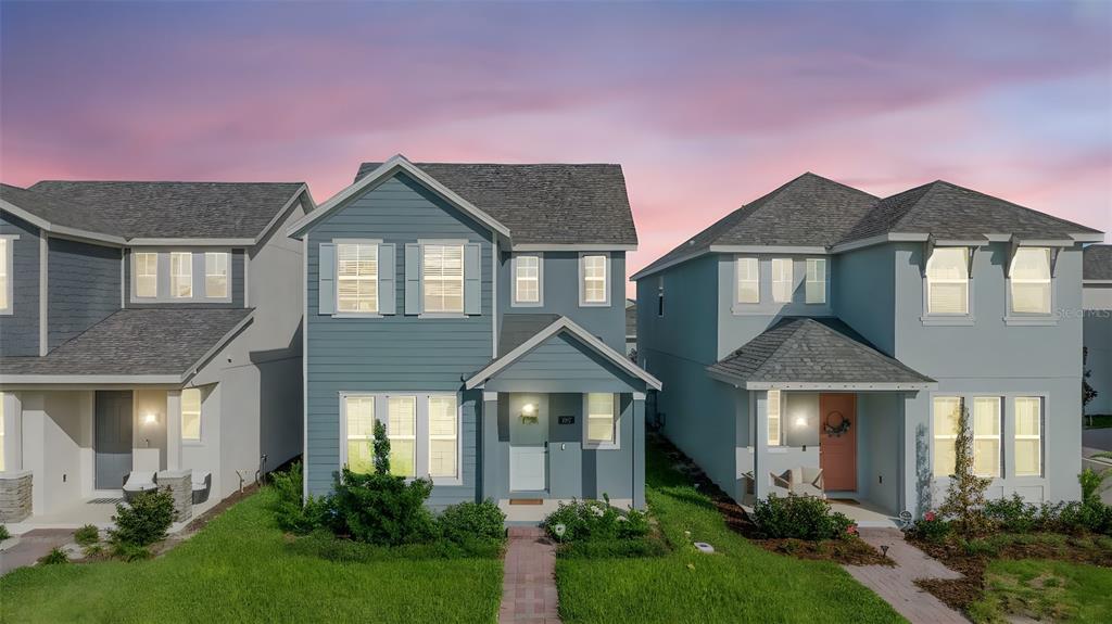 269 Platform Lane DeBary, FL 32713 - Photo 1 of 41 a front view of a house with yard and green space
