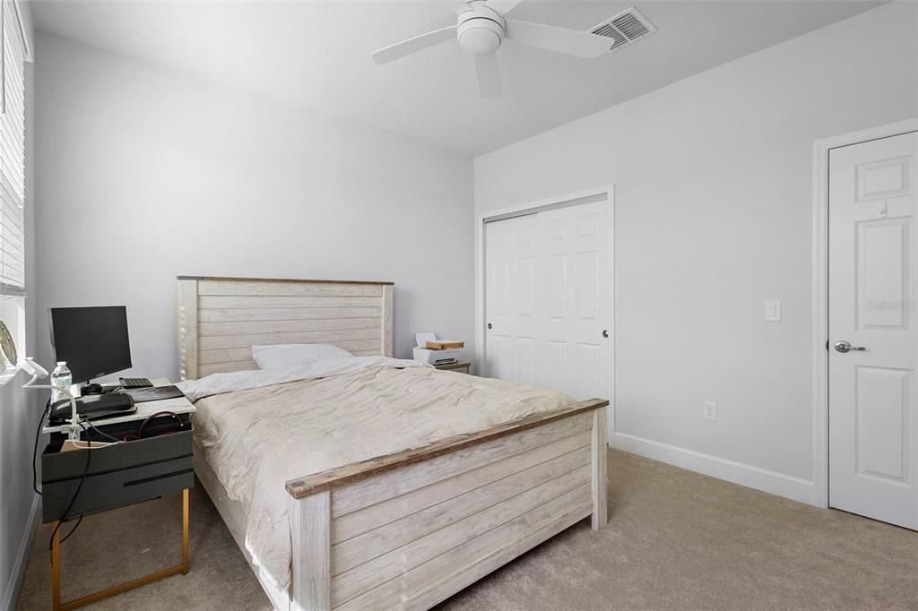 269 Platform Lane DeBary, FL 32713 - Photo 23 of 41 a bedroom with a bed and a tv
