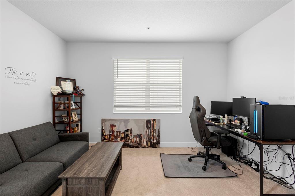 269 Platform Lane DeBary, FL 32713 - Photo 32 of 41 a view of a livingroom with workspace and a couch