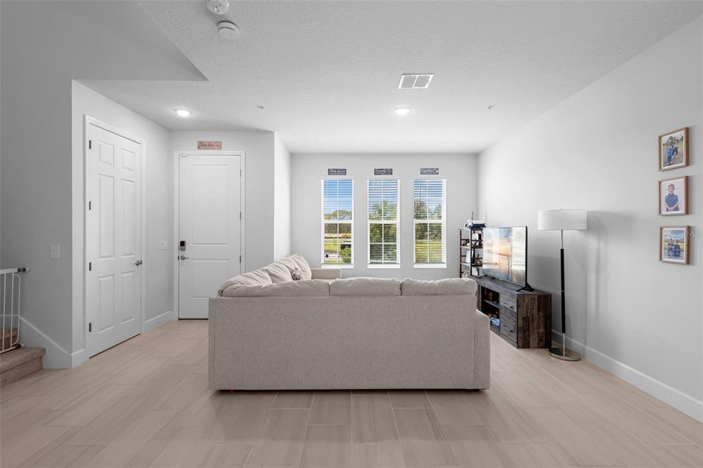 269 Platform Lane DeBary, FL 32713 - Photo 40 of 41 a living room with furniture and large window