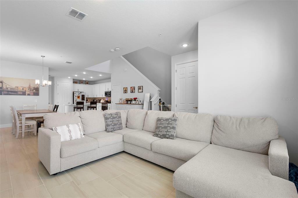 269 Platform Lane DeBary, FL 32713 - Photo 8 of 41 a living room with furniture and view of kitchen
