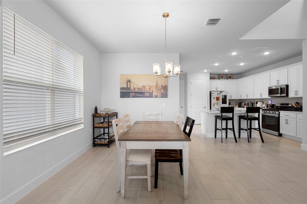 269 Platform Lane DeBary, FL 32713 - Photo 10 of 41 a dining room with furniture and window