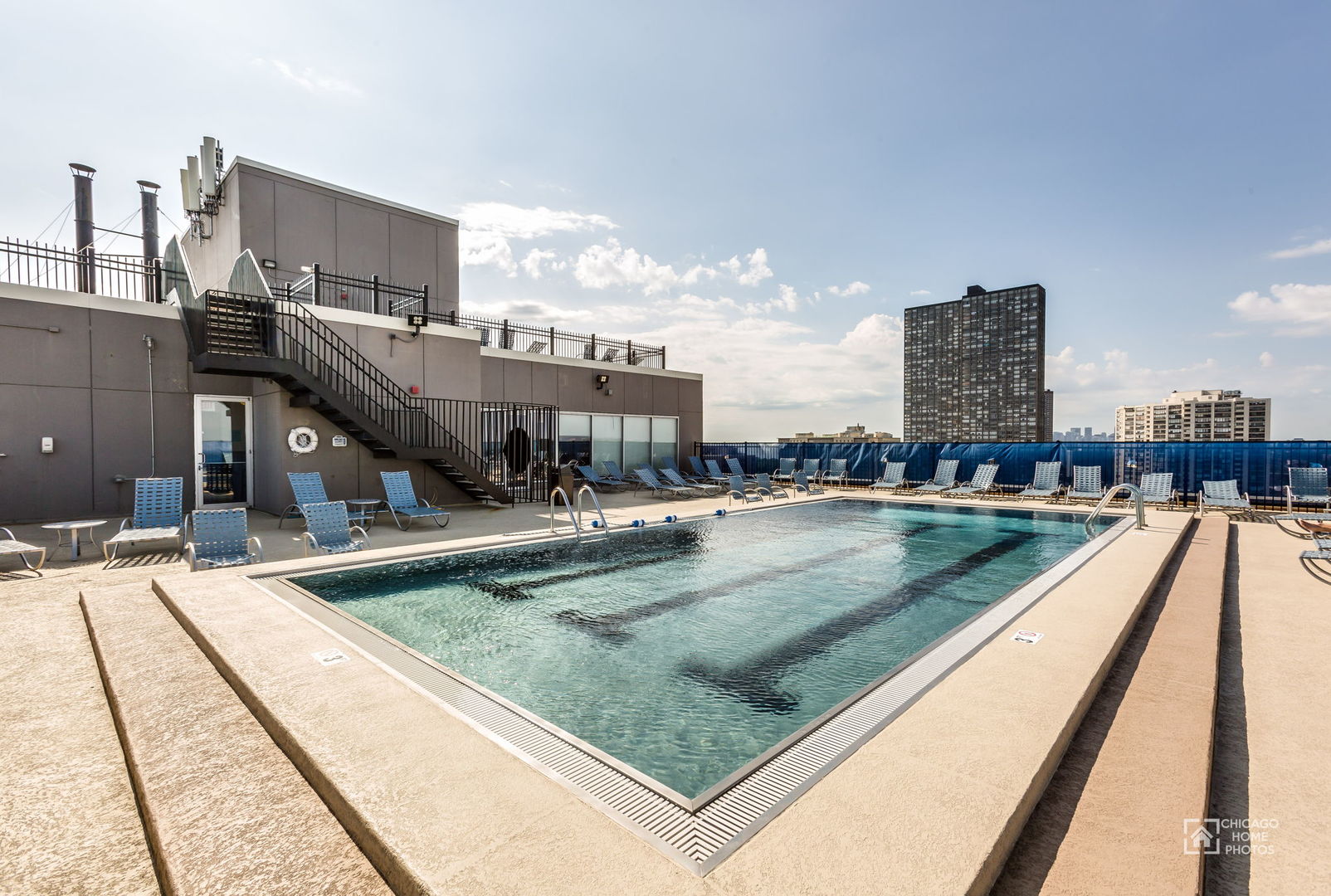 720 West Gordon Terrace, Unit 16E Chicago, IL 60613 - Photo 24 of 34 a view of swimming pool with outdoor seating and city view