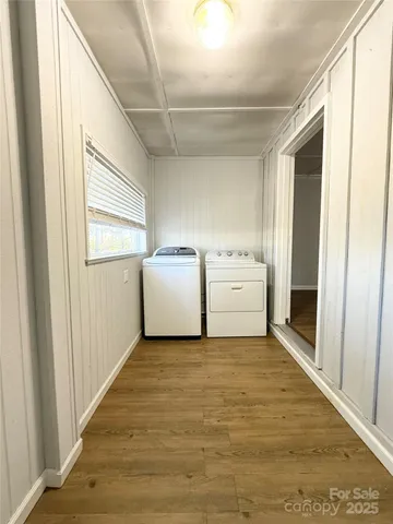 a view of a storage & utility room with washer and dryer