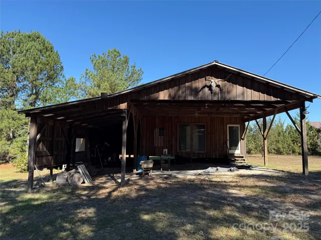 a front view of a house with yard