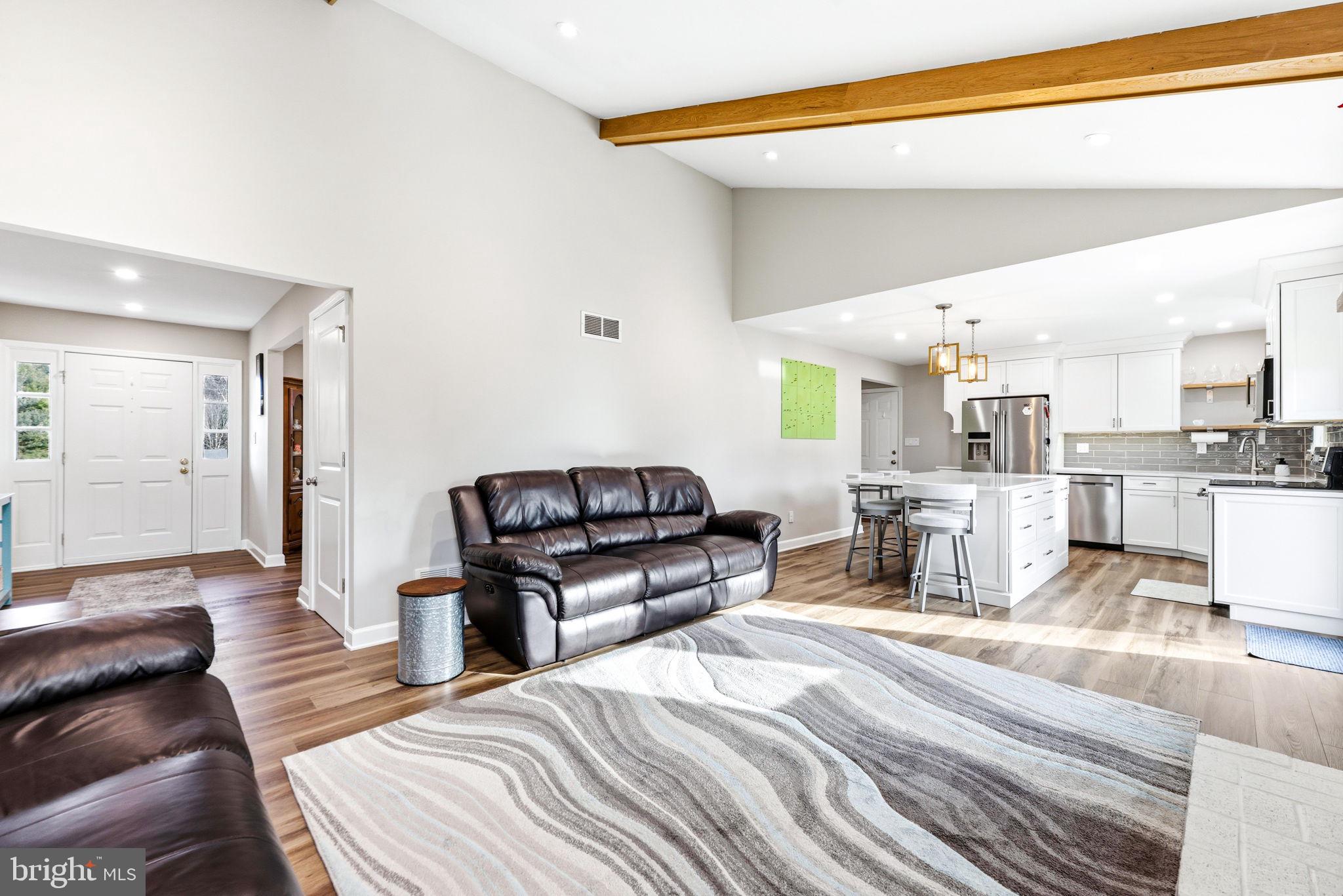 16932 Flickerwood Road Parkton, MD 21120 - Photo 11 of 64 a living room with furniture and a table