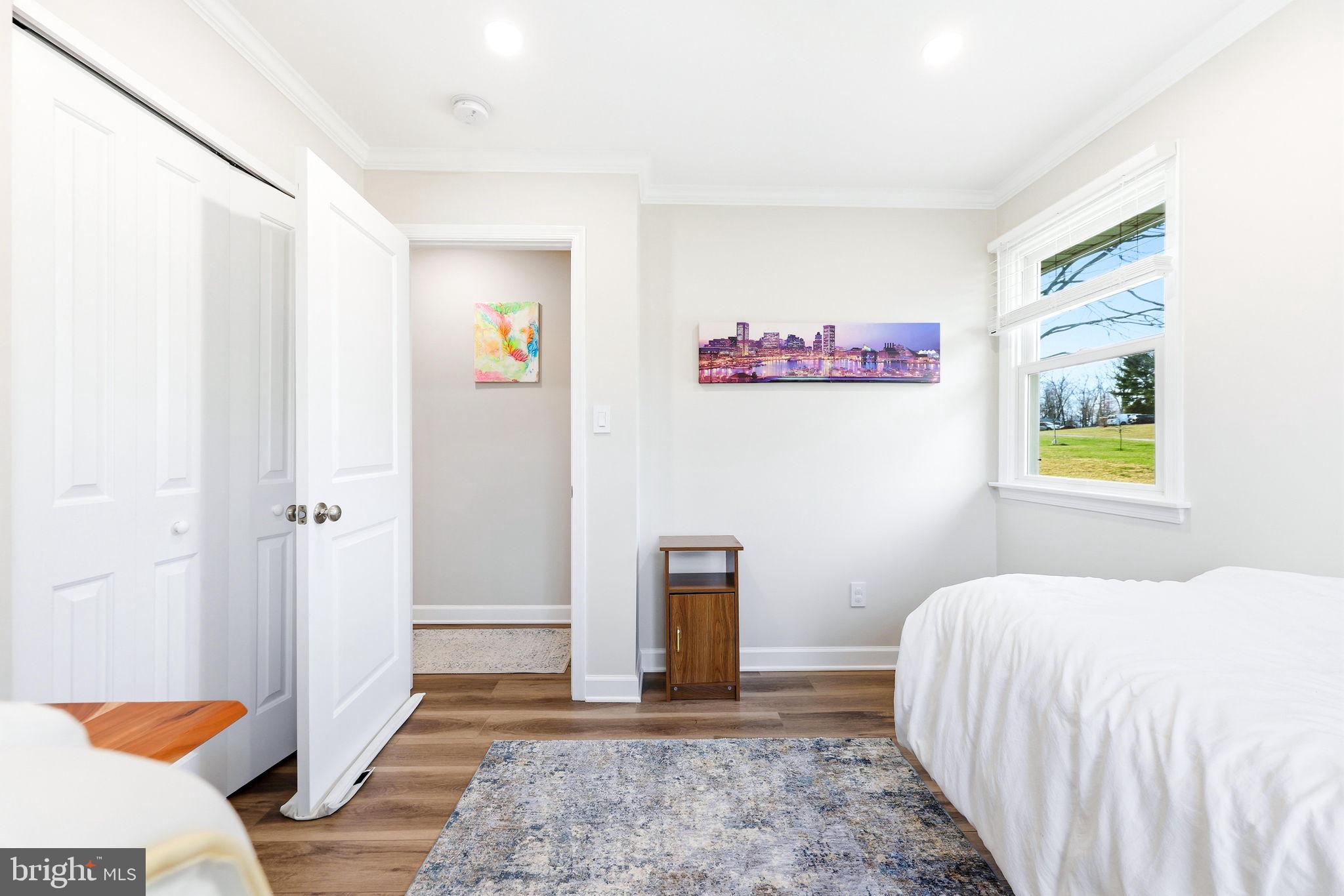 16932 Flickerwood Road Parkton, MD 21120 - Photo 26 of 64 a bedroom with a bed and a couch