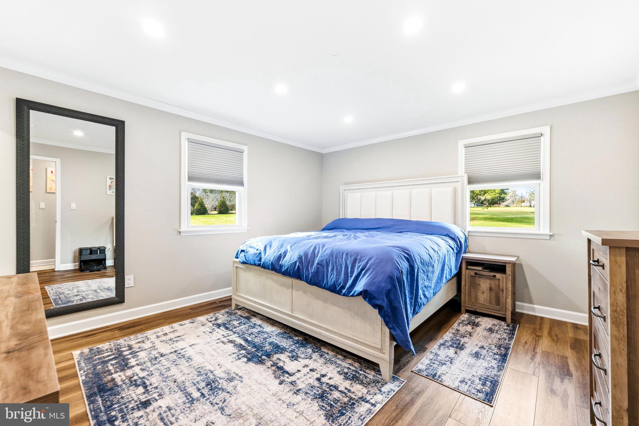 16932 Flickerwood Road Parkton, MD 21120 - Photo 30 of 64 a bedroom with a bed and wooden floor