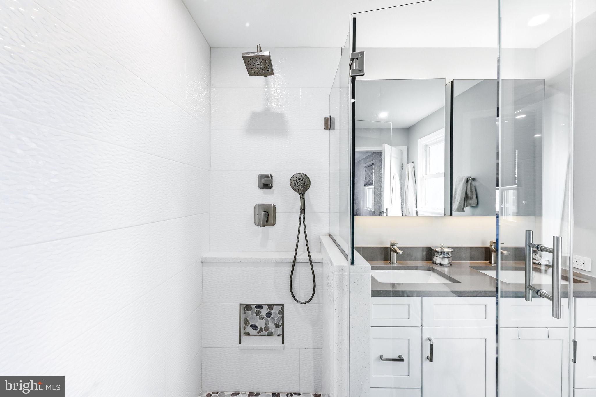 16932 Flickerwood Road Parkton, MD 21120 - Photo 33 of 64 a bathroom with a granite countertop shower sink and mirror