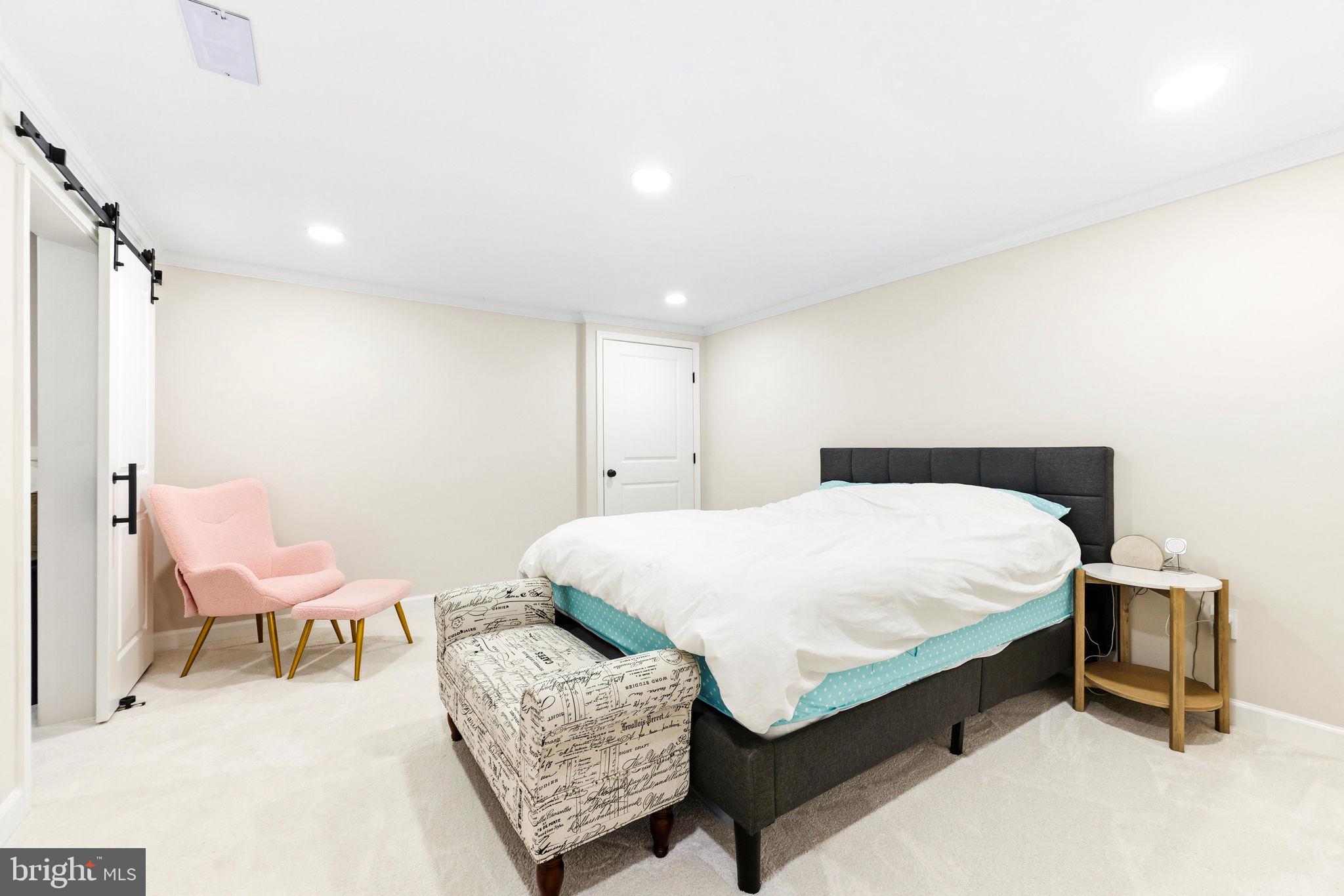 16932 Flickerwood Road Parkton, MD 21120 - Photo 40 of 64 a bed room with a bed and chair