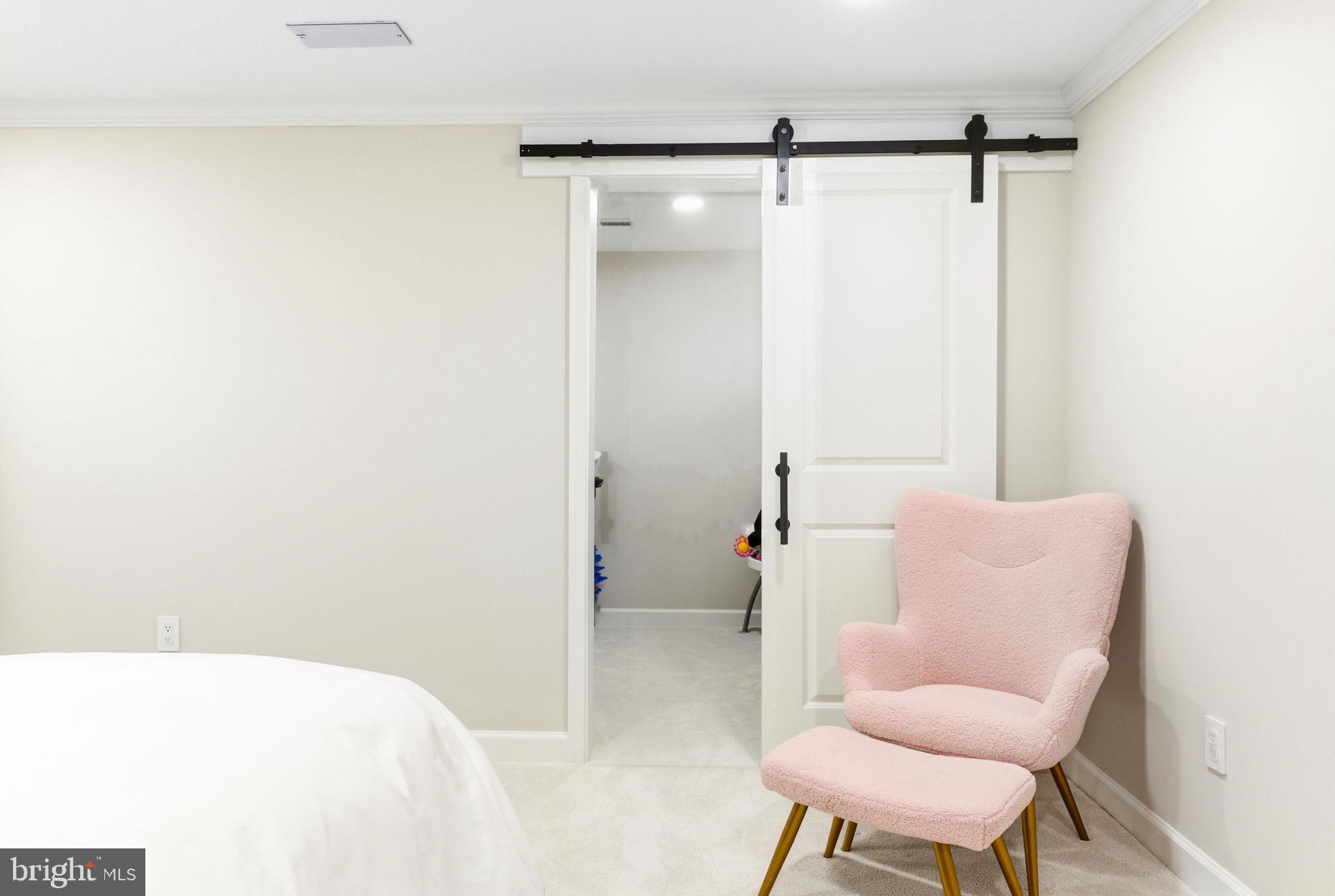 16932 Flickerwood Road Parkton, MD 21120 - Photo 41 of 64 a bedroom with a bed and a chair