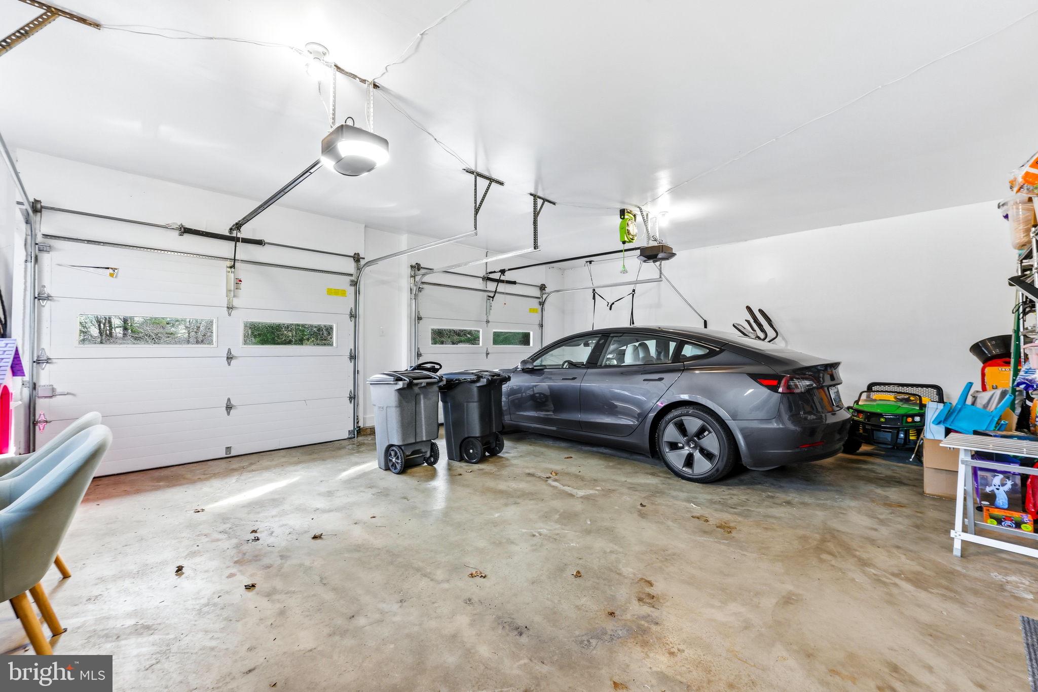 16932 Flickerwood Road Parkton, MD 21120 - Photo 44 of 64 a view of a garage and car parked