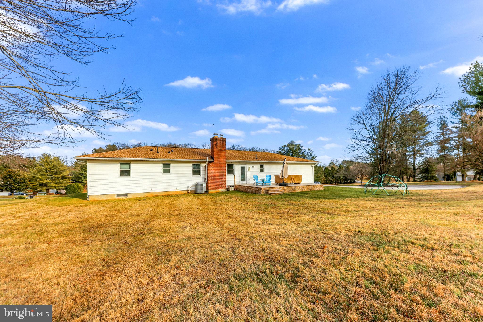 16932 Flickerwood Road Parkton, MD 21120 - Photo 50 of 64 a view of a house with a yard