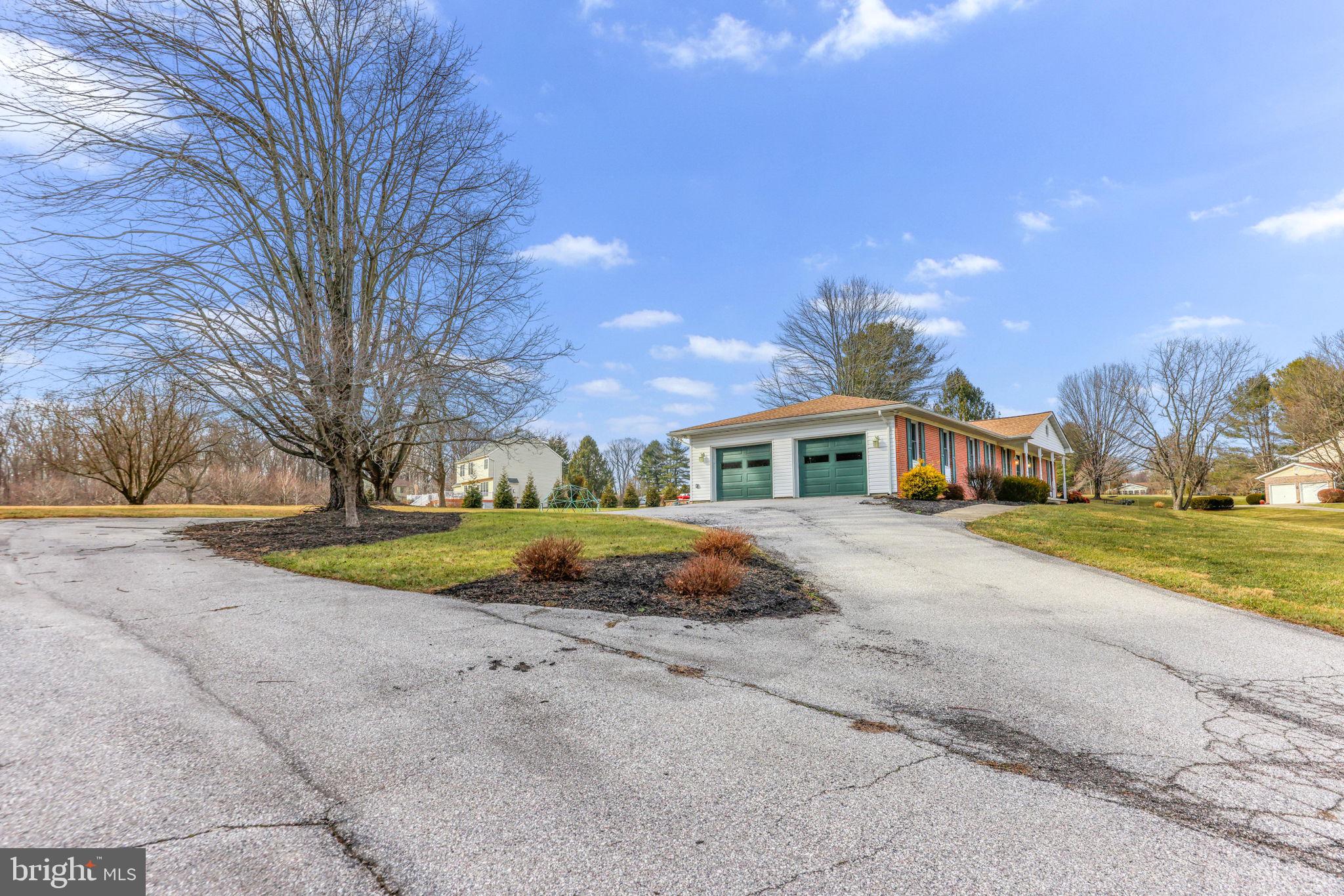 16932 Flickerwood Road Parkton, MD 21120 - Photo 59 of 64 a front view of a house with a yard