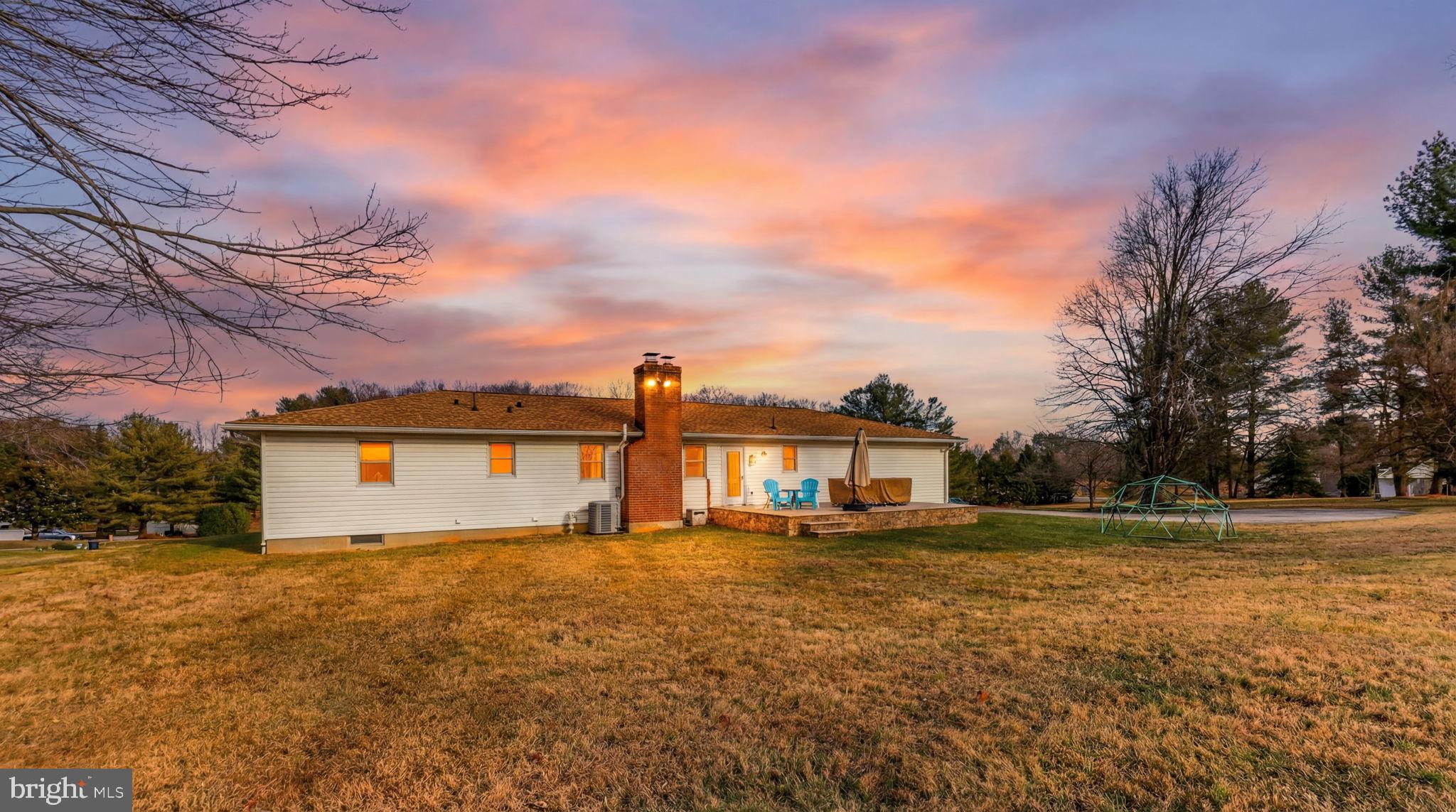16932 Flickerwood Road Parkton, MD 21120 - Photo 64 of 64 a front view of a house with a yard and lake view