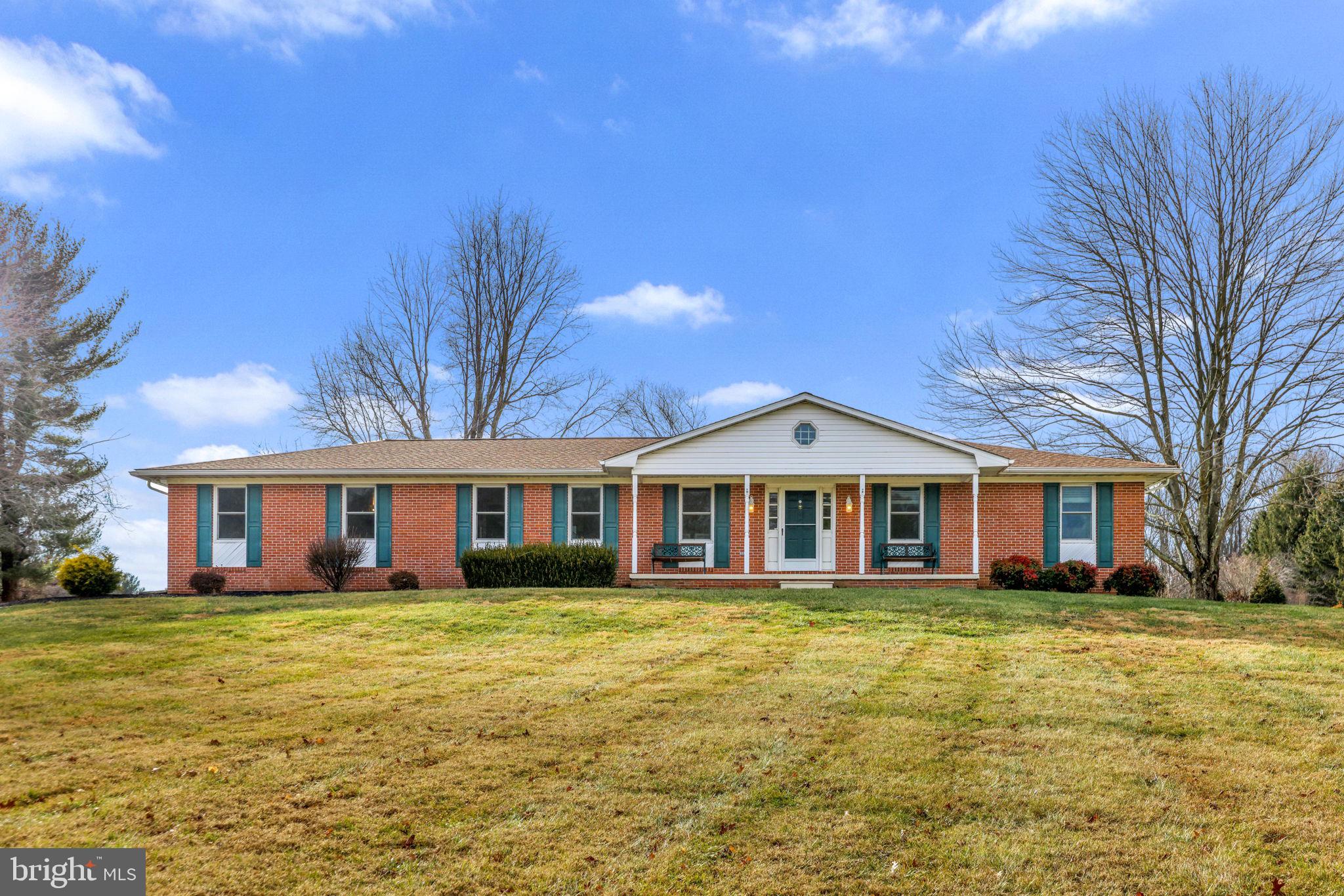 16932 Flickerwood Road Parkton, MD 21120 - Photo 7 of 64 a front view of a house with a yard