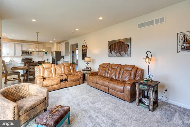 a living room with furniture and a couch