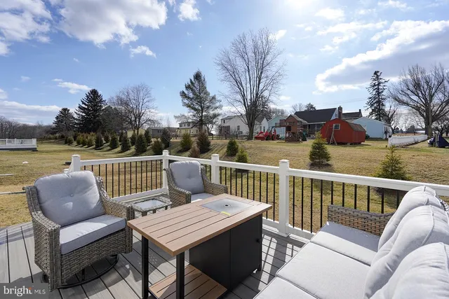 a view of a patio on a deck