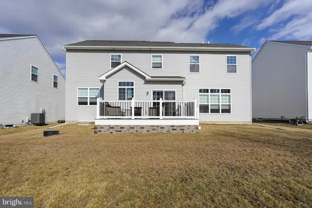 a view of a house with a sink and yard