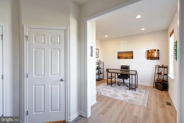 a view of a livingroom with furniture and wooden floor