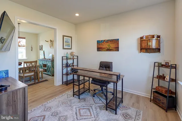 a view of a workspace with furniture