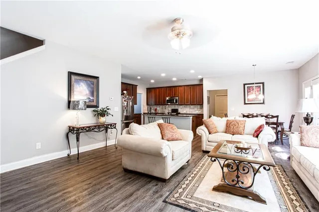 a living room with furniture or couch and a coffee table