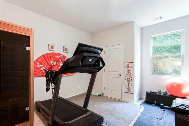 a room with furniture and a window