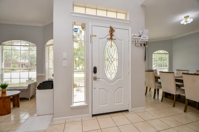 a view of a livingroom with furniture and windows