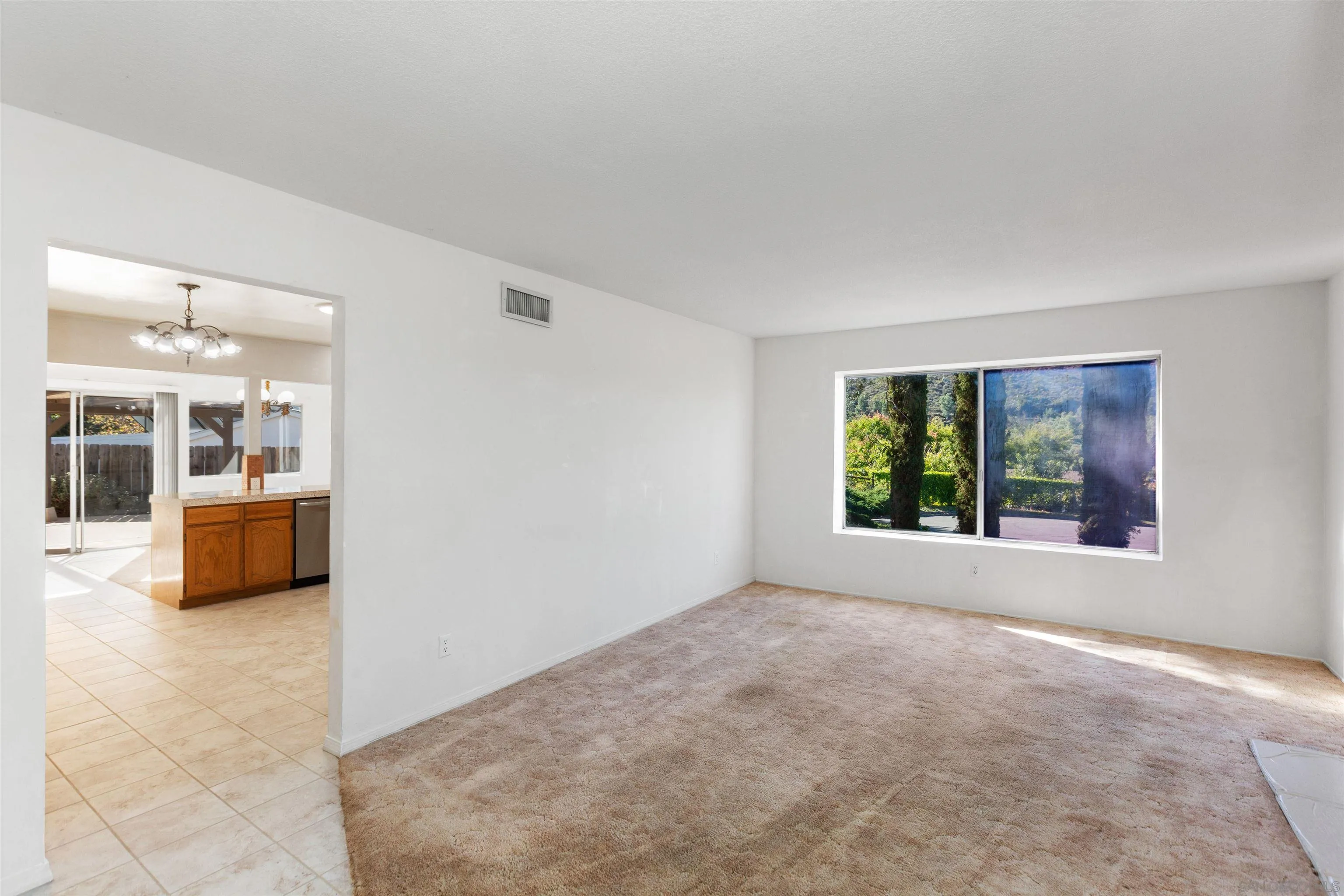 14537 Range Park Place Poway, CA 92064 - Photo 14 of 46 a view of an empty room with a window