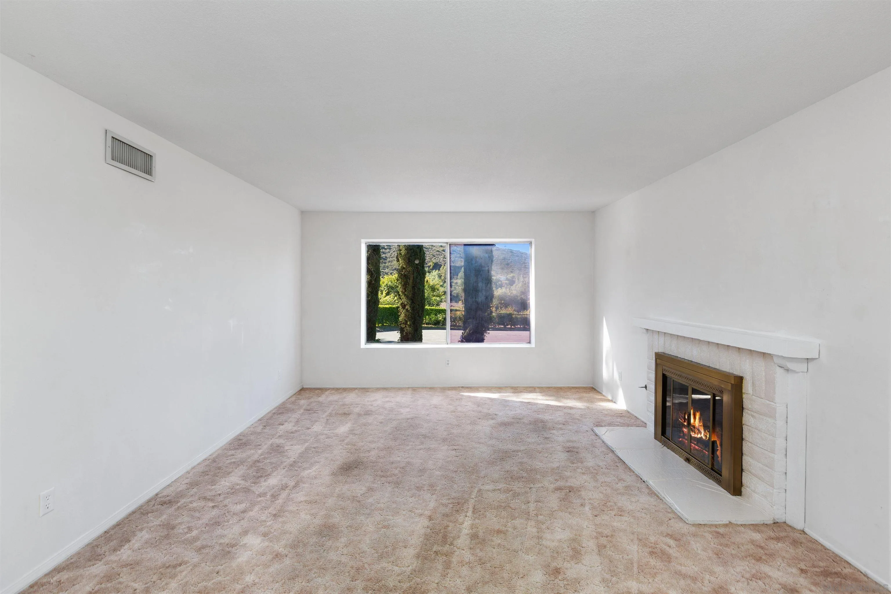 14537 Range Park Place Poway, CA 92064 - Photo 15 of 46 a view of empty room with front door
