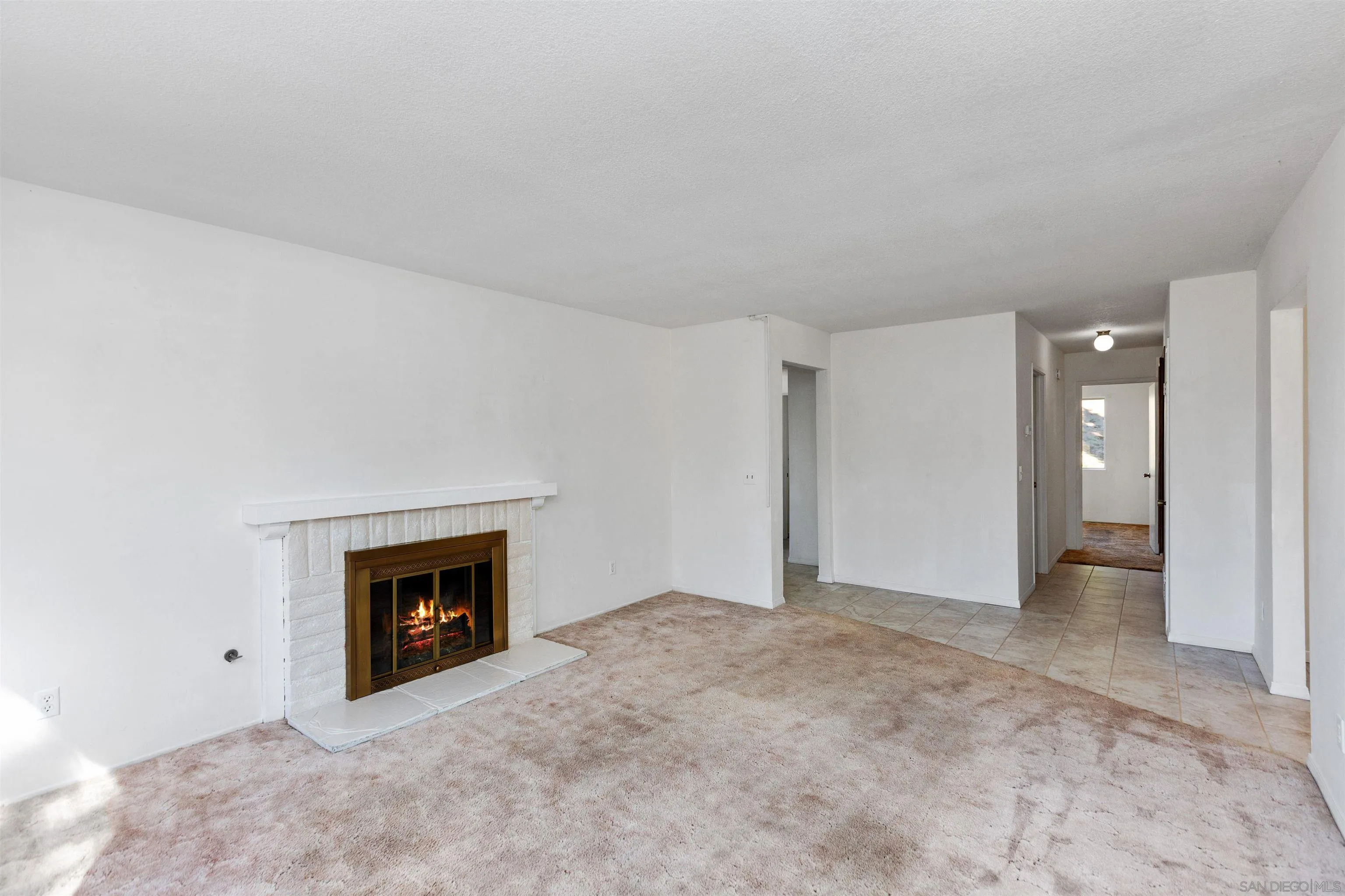 14537 Range Park Place Poway, CA 92064 - Photo 16 of 46 a view of empty room with a fireplace