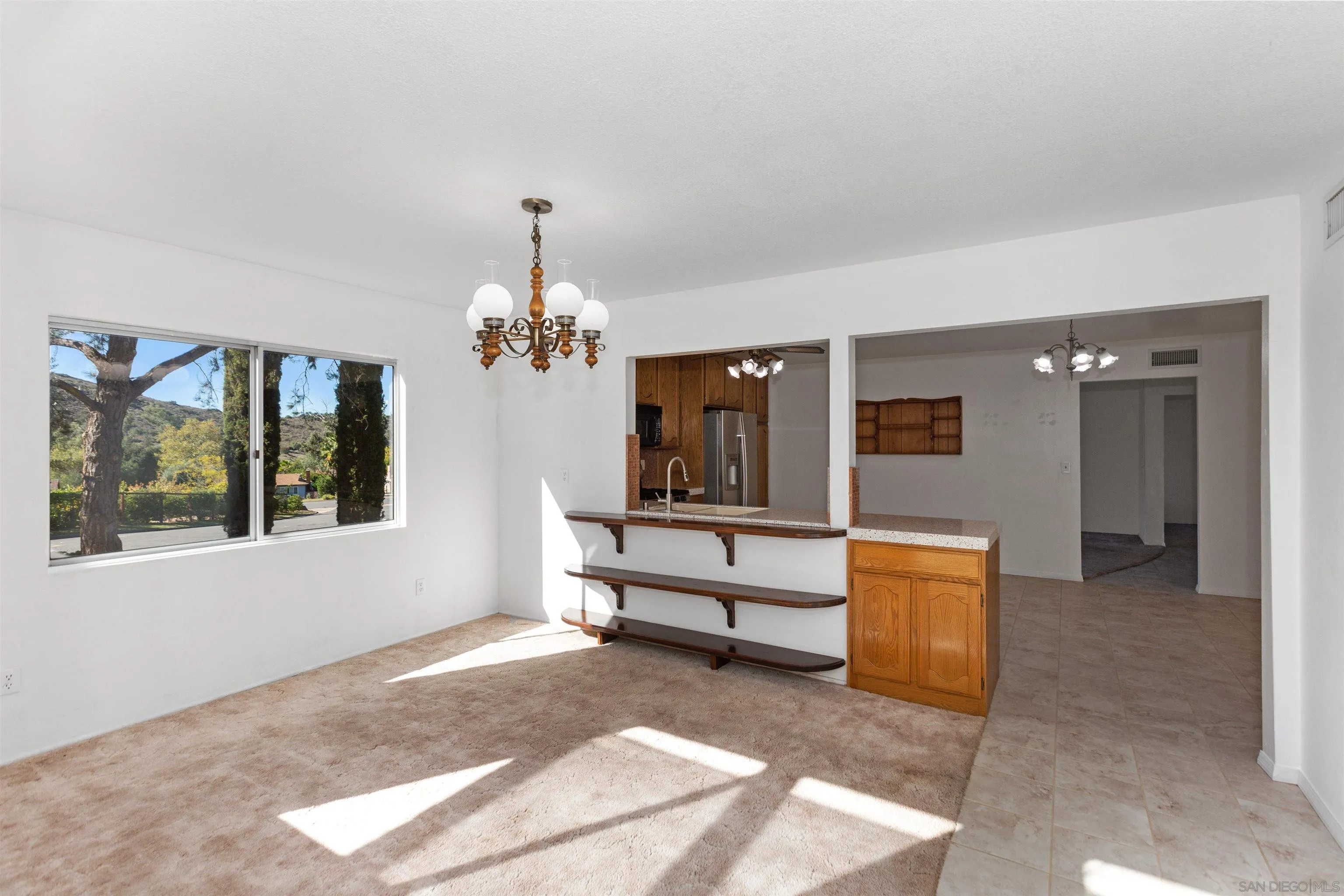 14537 Range Park Place Poway, CA 92064 - Photo 22 of 46 a view of a livingroom with furniture and window