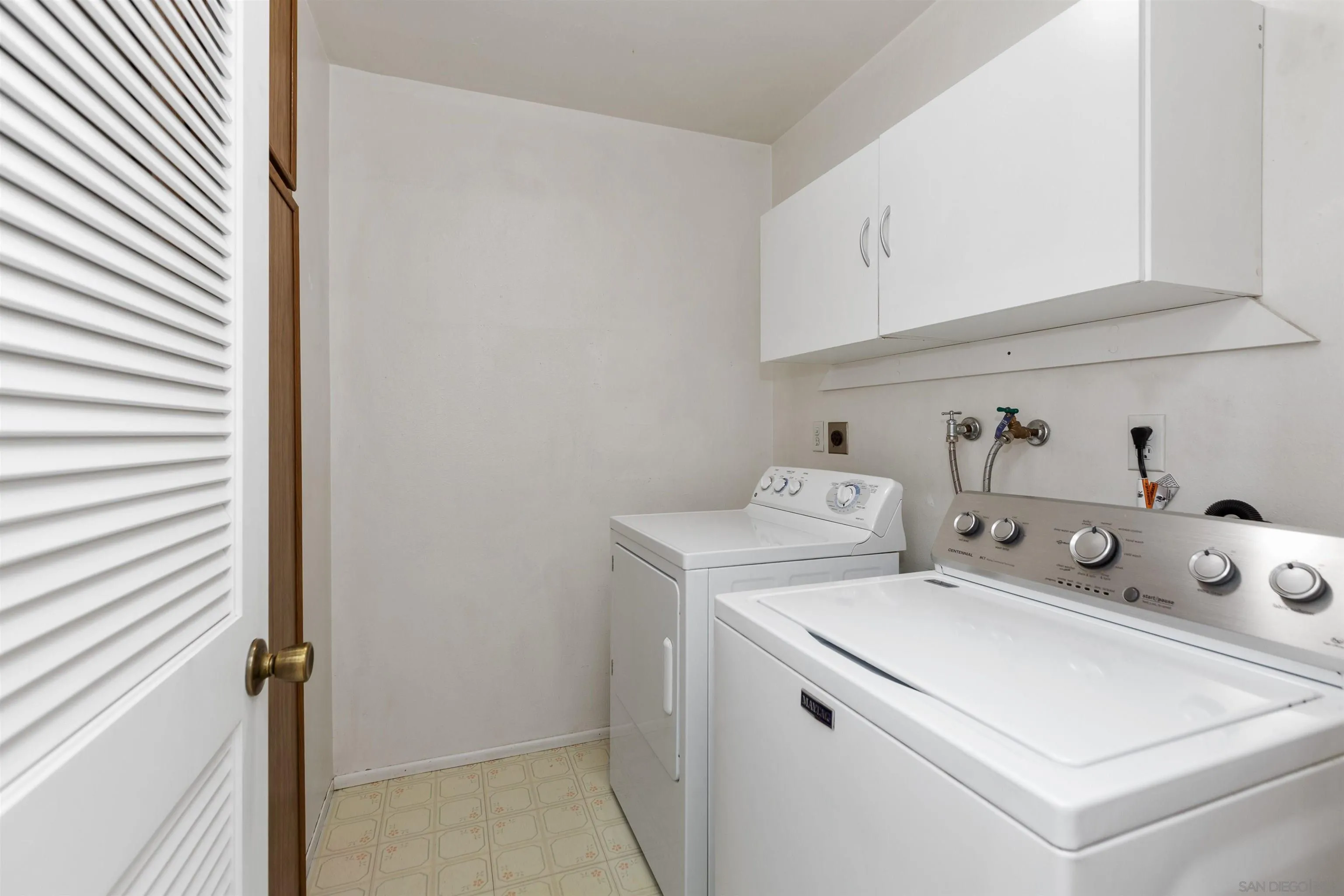 14537 Range Park Place Poway, CA 92064 - Photo 26 of 46 a utility room with dryer and washer
