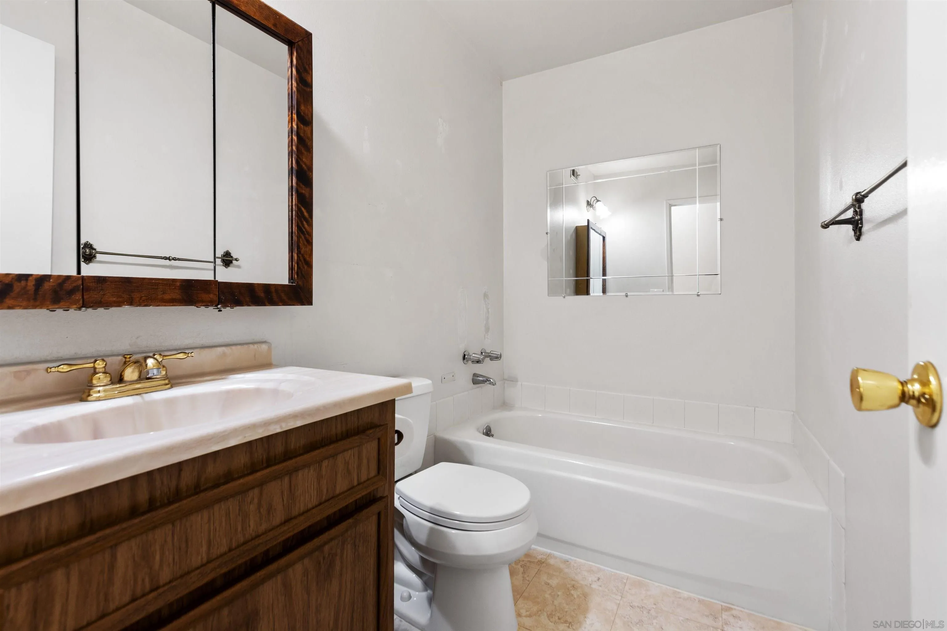 14537 Range Park Place Poway, CA 92064 - Photo 28 of 46 a bathroom with a sink a toilet and shower