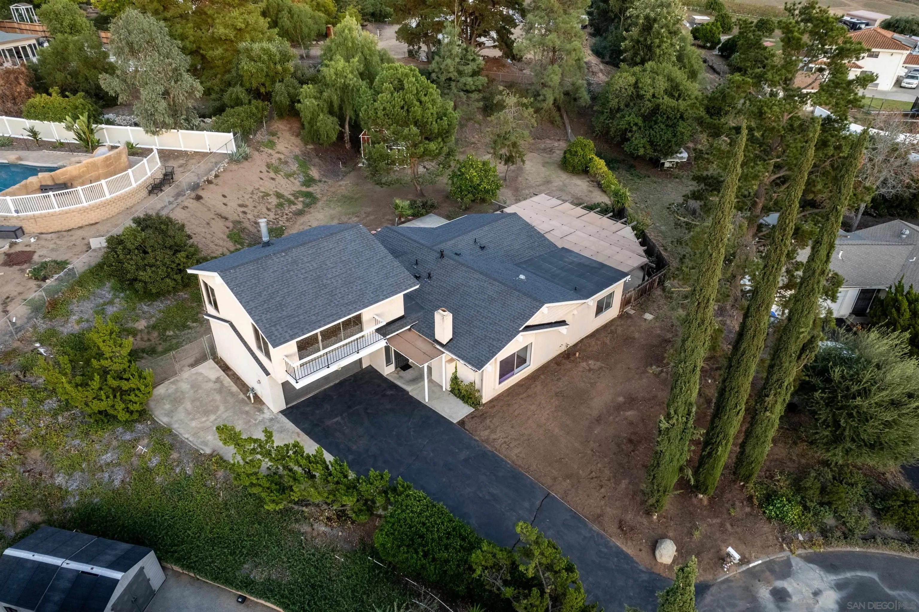 14537 Range Park Place Poway, CA 92064 - Photo 3 of 46 an aerial view of a house with a yard patio and outdoor seating