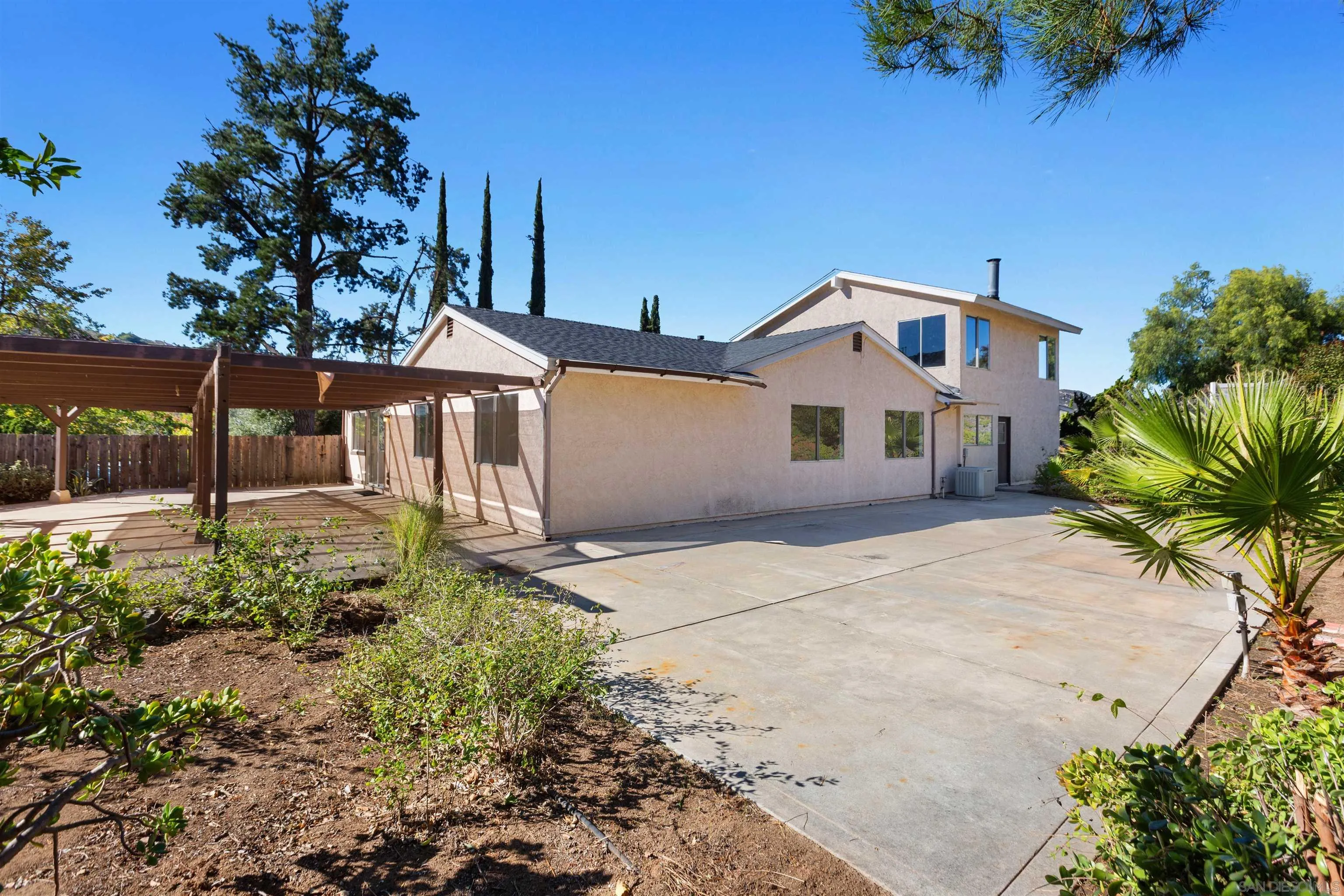 14537 Range Park Place Poway, CA 92064 - Photo 38 of 46 a front view of a house with a garden