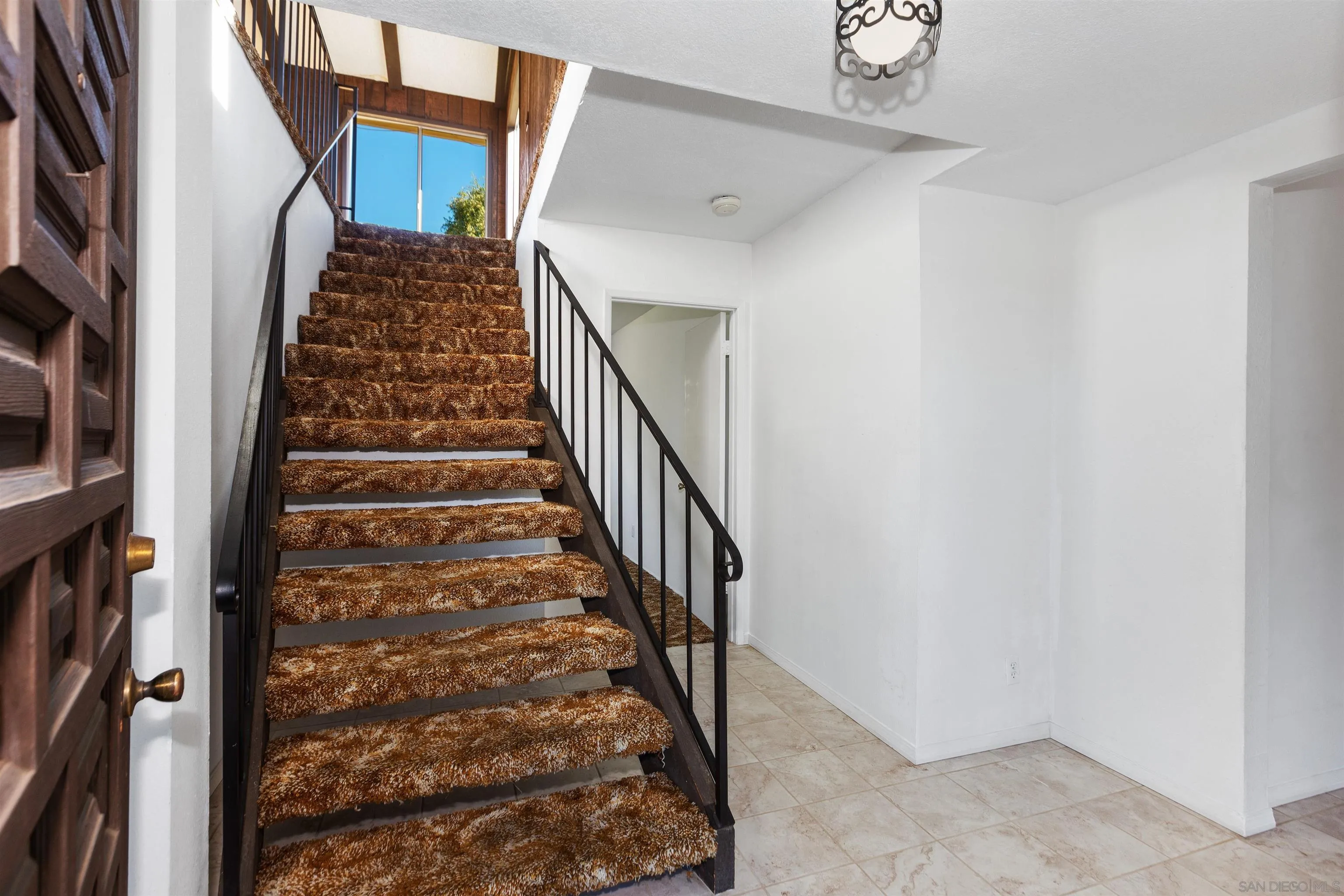 14537 Range Park Place Poway, CA 92064 - Photo 10 of 46 a view of entryway with a front door