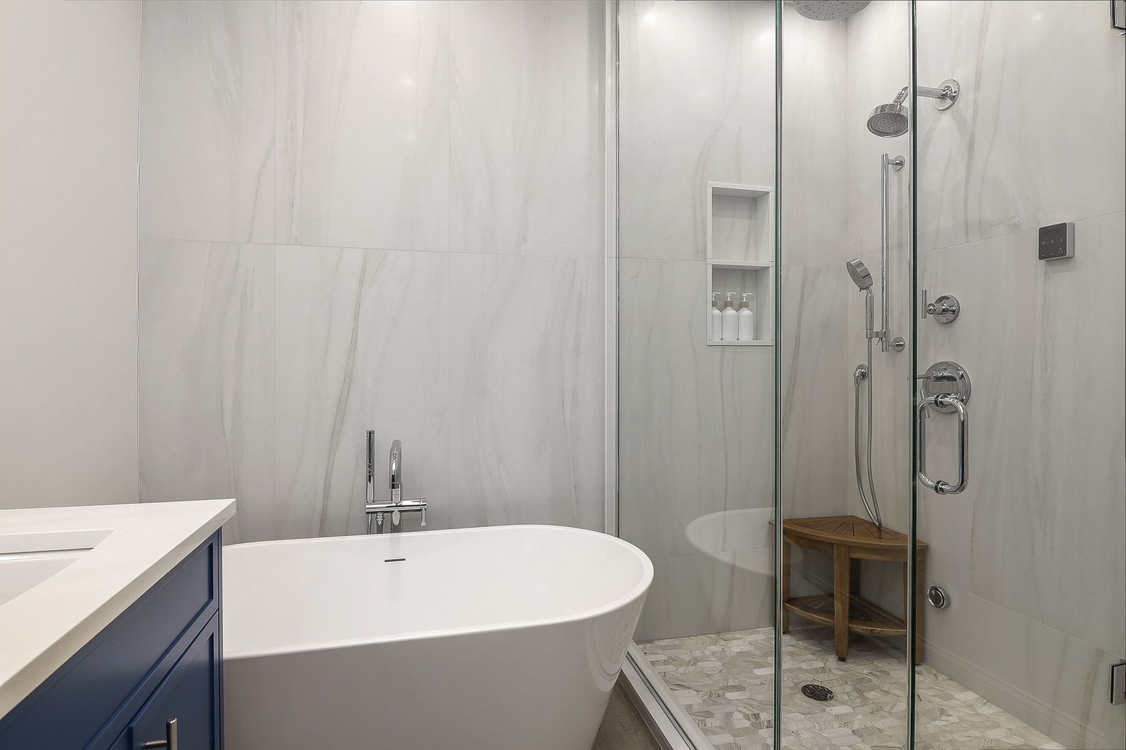 39 North Morgan Street, Unit 3 Chicago, IL 60607 - Photo 11 of 18 a bathroom with a white tub shower and sink