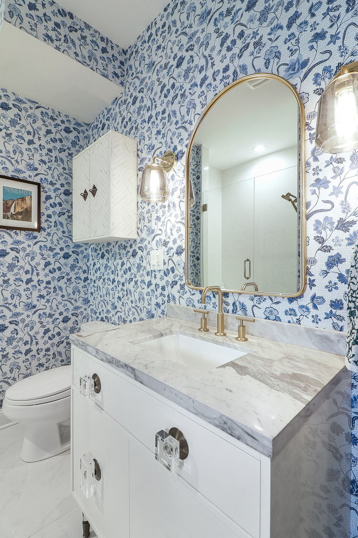 39 North Morgan Street, Unit 3 Chicago, IL 60607 - Photo 13 of 18 a bathroom with a sink a toilet and mirror