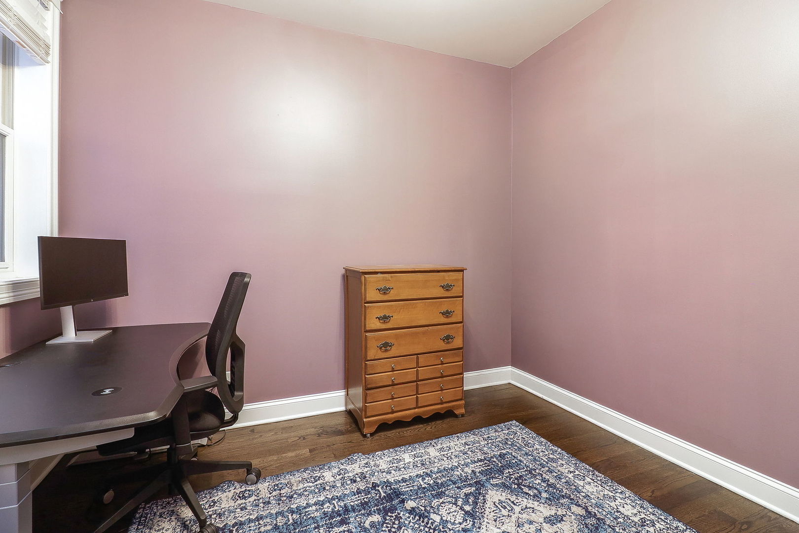 39 North Morgan Street, Unit 3 Chicago, IL 60607 - Photo 15 of 18 a view of a workspace with furniture and a window