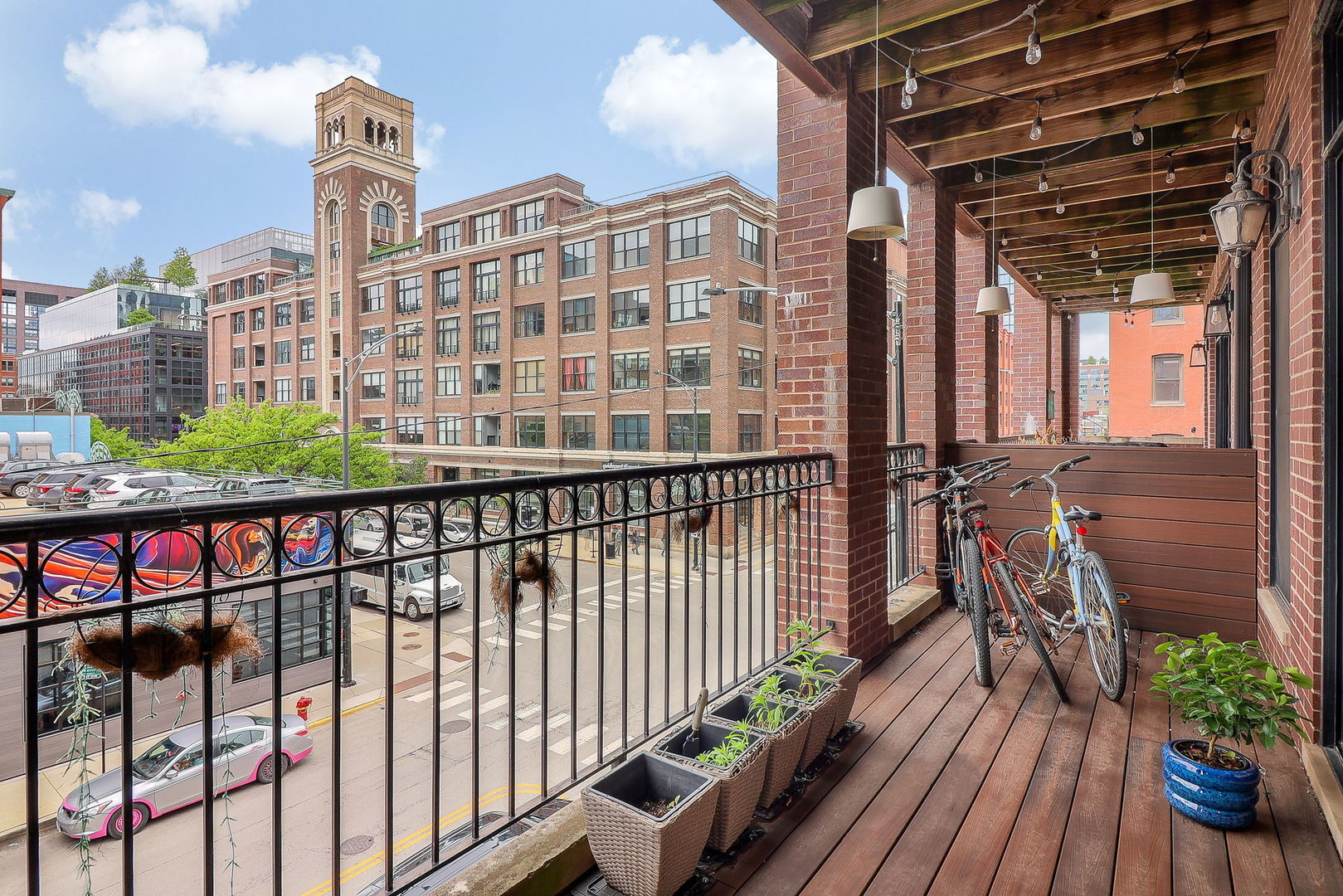 39 North Morgan Street, Unit 3 Chicago, IL 60607 - Photo 17 of 18 a view of a balcony with chairs