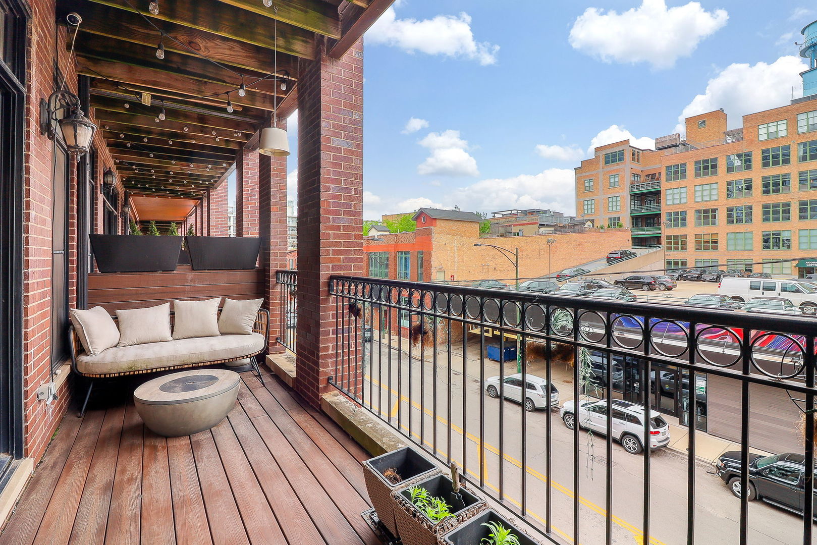 39 North Morgan Street, Unit 3 Chicago, IL 60607 - Photo 18 of 18 a view of a balcony with a couch
