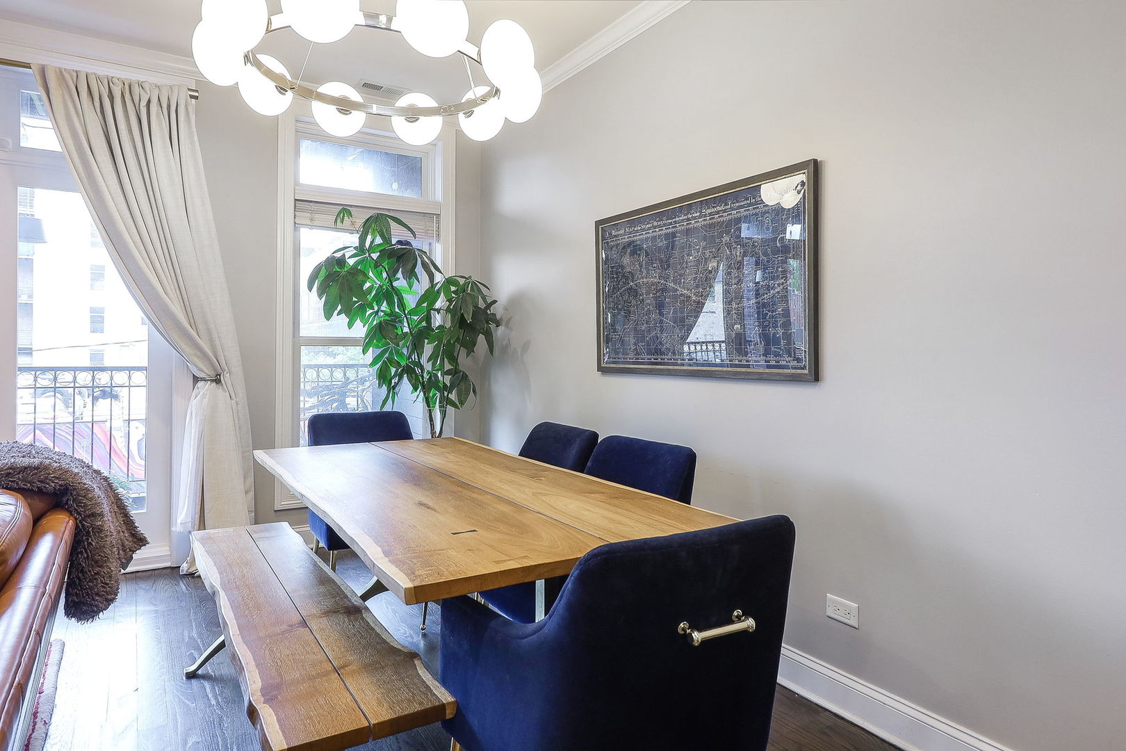 39 North Morgan Street, Unit 3 Chicago, IL 60607 - Photo 4 of 18 a view of a dining room with furniture and a chandelier