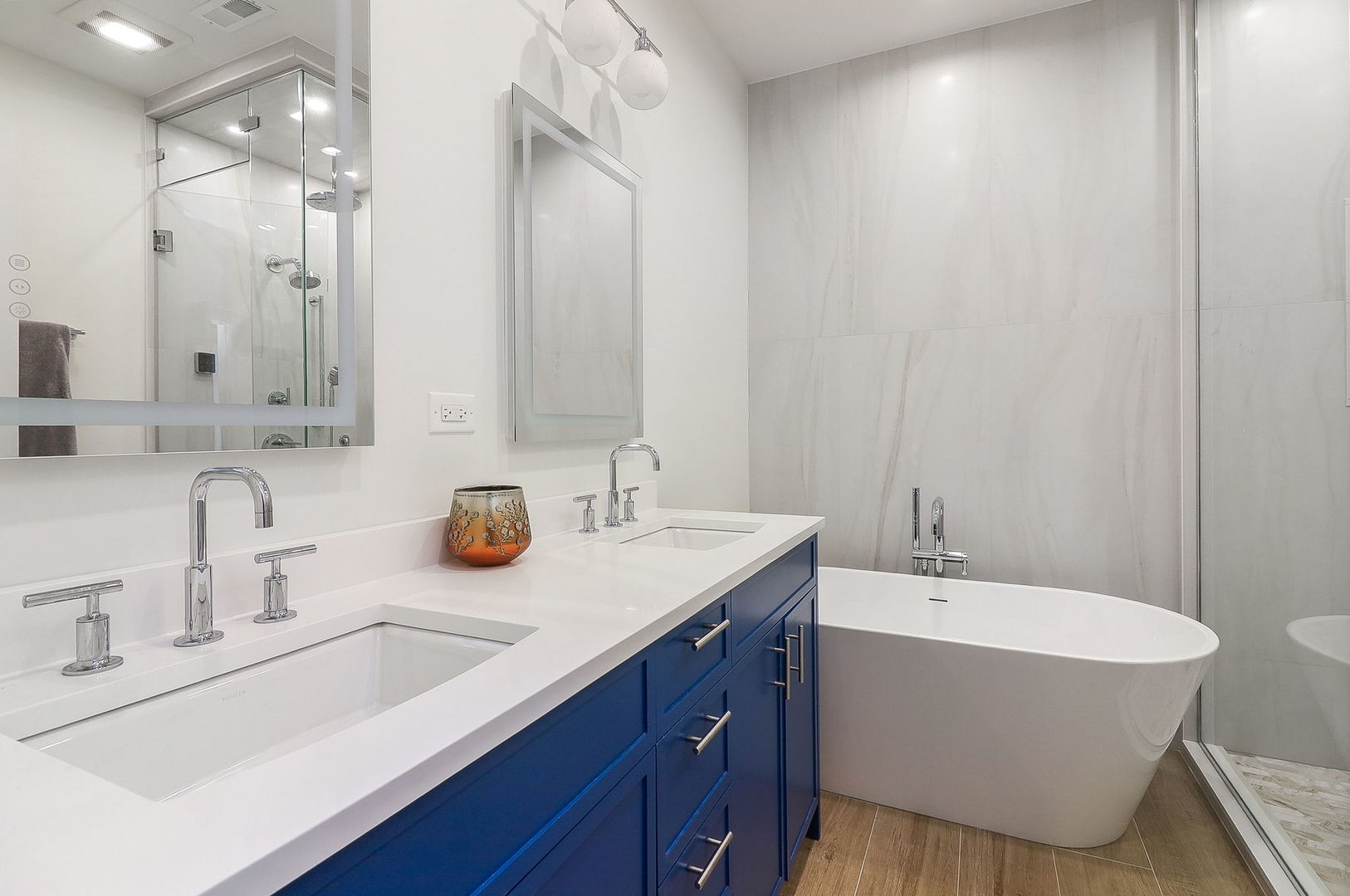 39 North Morgan Street, Unit 3 Chicago, IL 60607 - Photo 10 of 18 a bathroom with a sink and a mirror