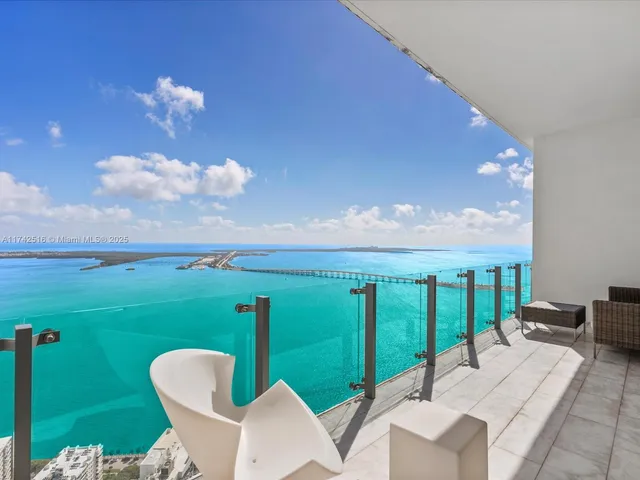 a view of a chairs and table in patio