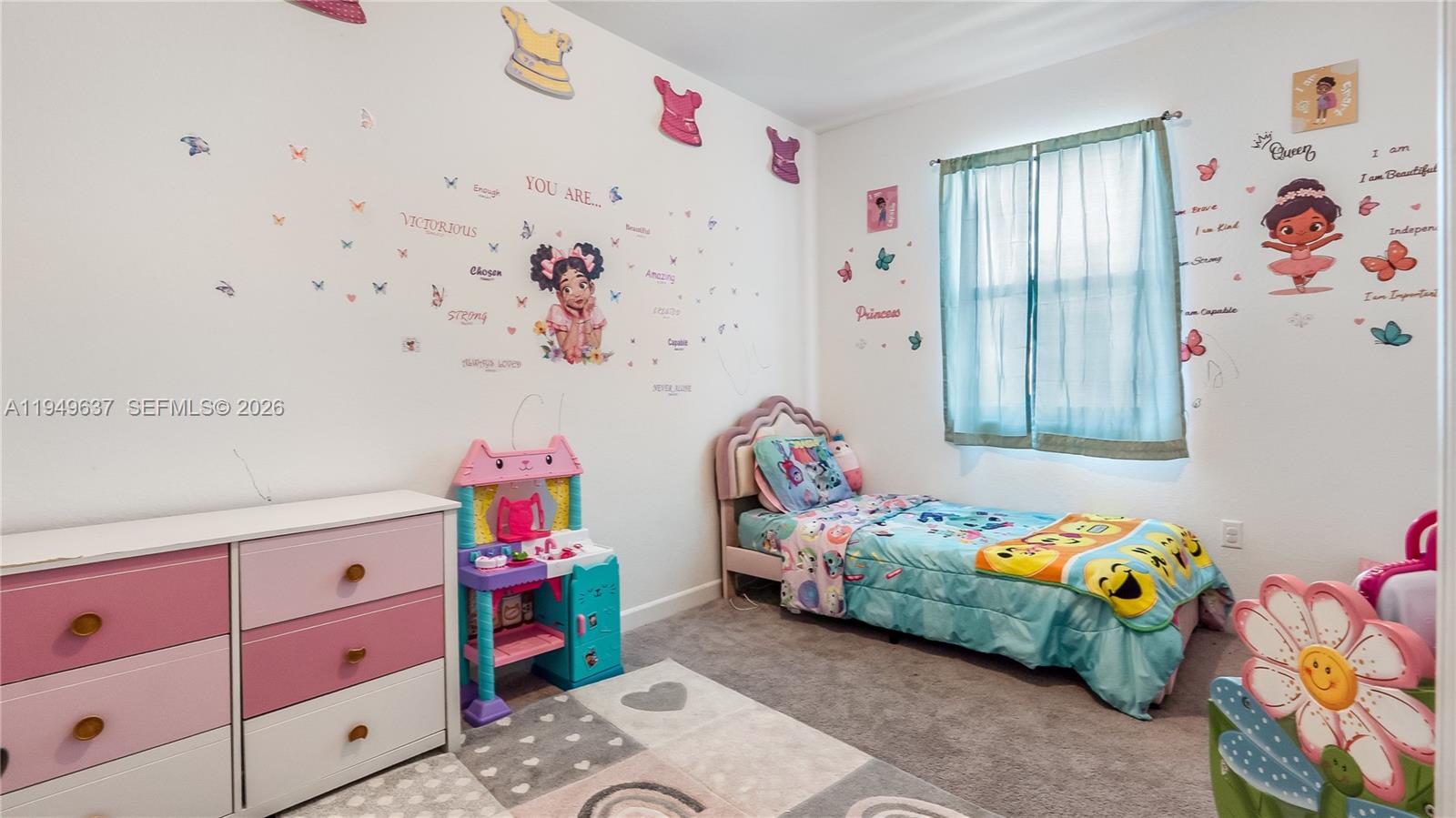 13410 Southwest 287th Terrace Homestead, FL 33033 - Photo 22 of 32 a bedroom with a bed and a dresser in it