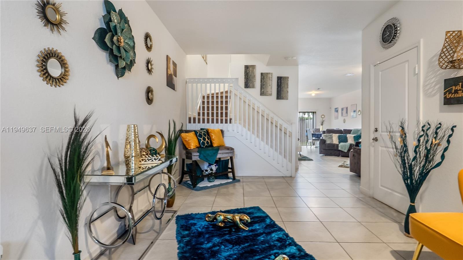 13410 Southwest 287th Terrace Homestead, FL 33033 - Photo 6 of 32 a bathroom with a sink and a mirror