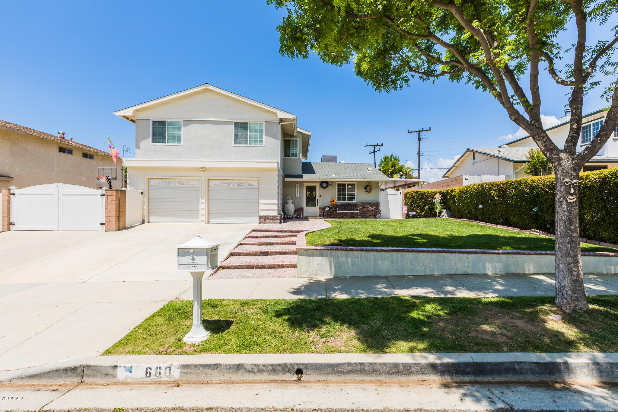 660 Appleton Road Simi Valley, CA 93065 - Photo 1 of 47 a front view of a house with a yard
